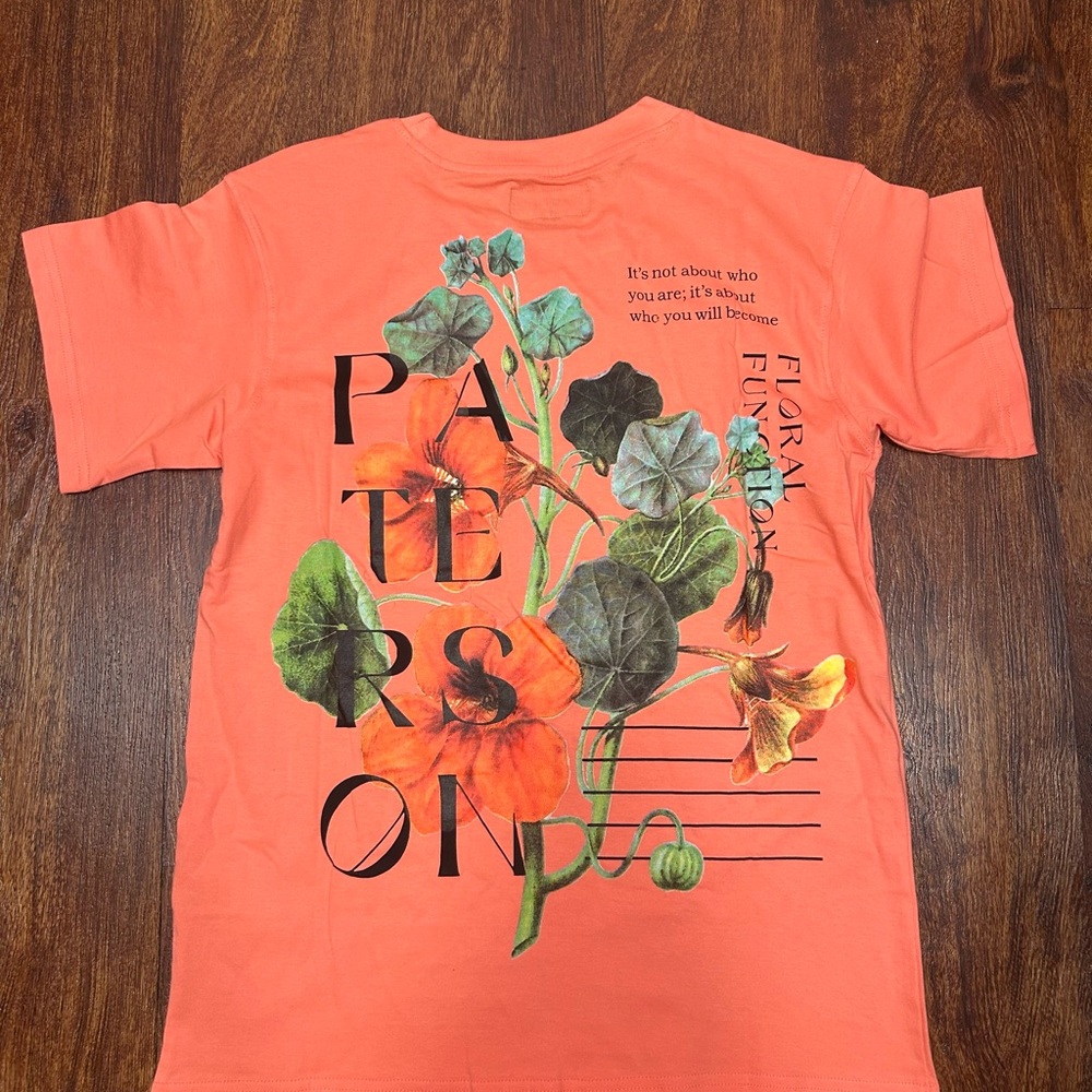Vibrant Orange Short Sleeve Tee with Modern Botanical Art